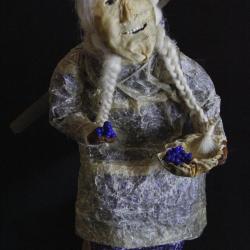 Chevak Cup'ik Doll holding Berries