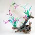 Orchid and Hummingbirds on driftwood base