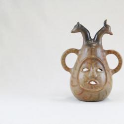 Face and Two Animal Head Candle Holder 